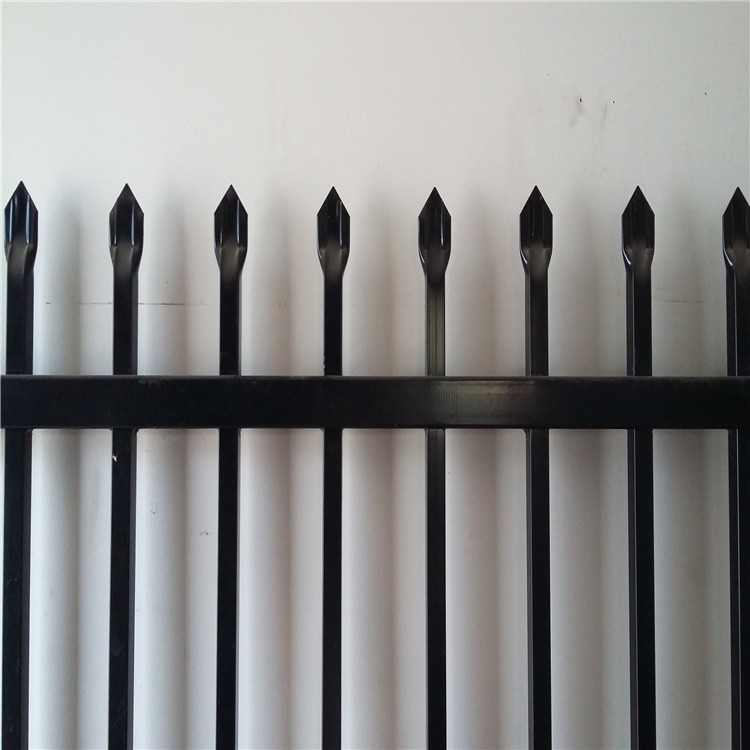 Ornamental iron fence points