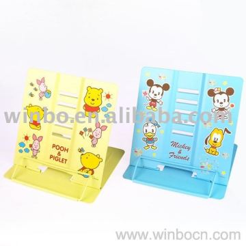 Tin cartoon students booking shelf bookend