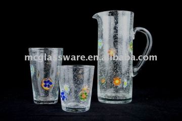 Clear bubbler glass pitcher/hiball/tumbler with flower ornaments