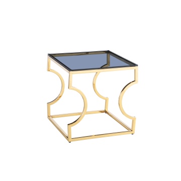 Mesa de canto geométrica dourada com vidro cinza fumê