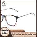 Armações ópticas combinadas de metal de acetato com design olho de gato
