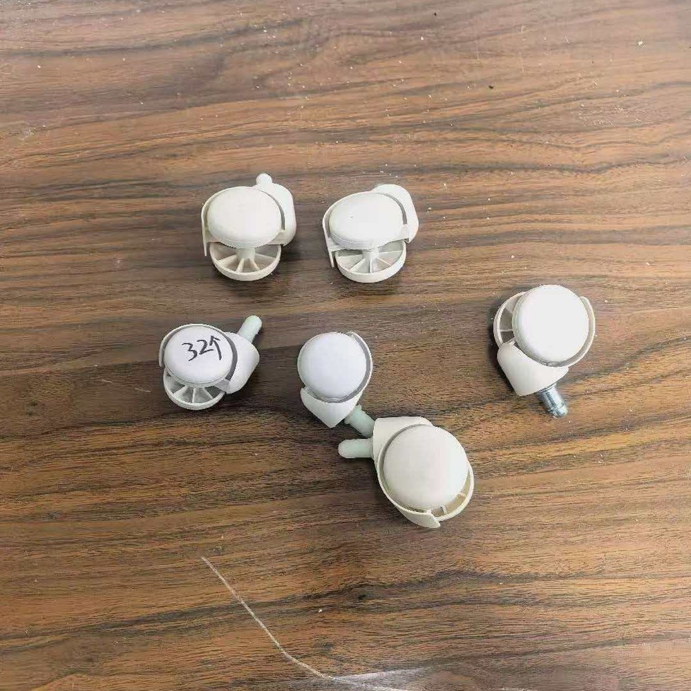 Small wheels of the suitcase injection mold