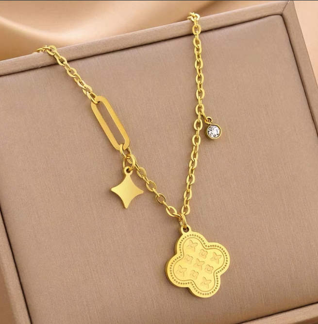A beautiful golden four-leaf clover necklace