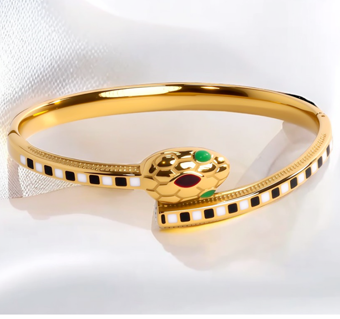 Gold, black and white diamond snake-shaped bracelet