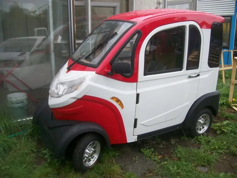 Green four-wheeled electric vehicle