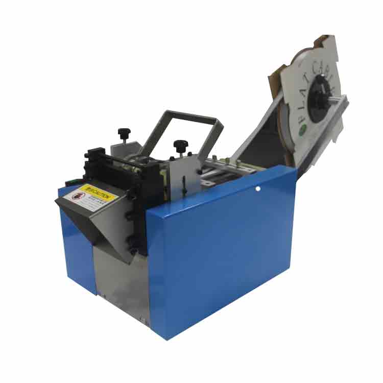 Roll material cutter